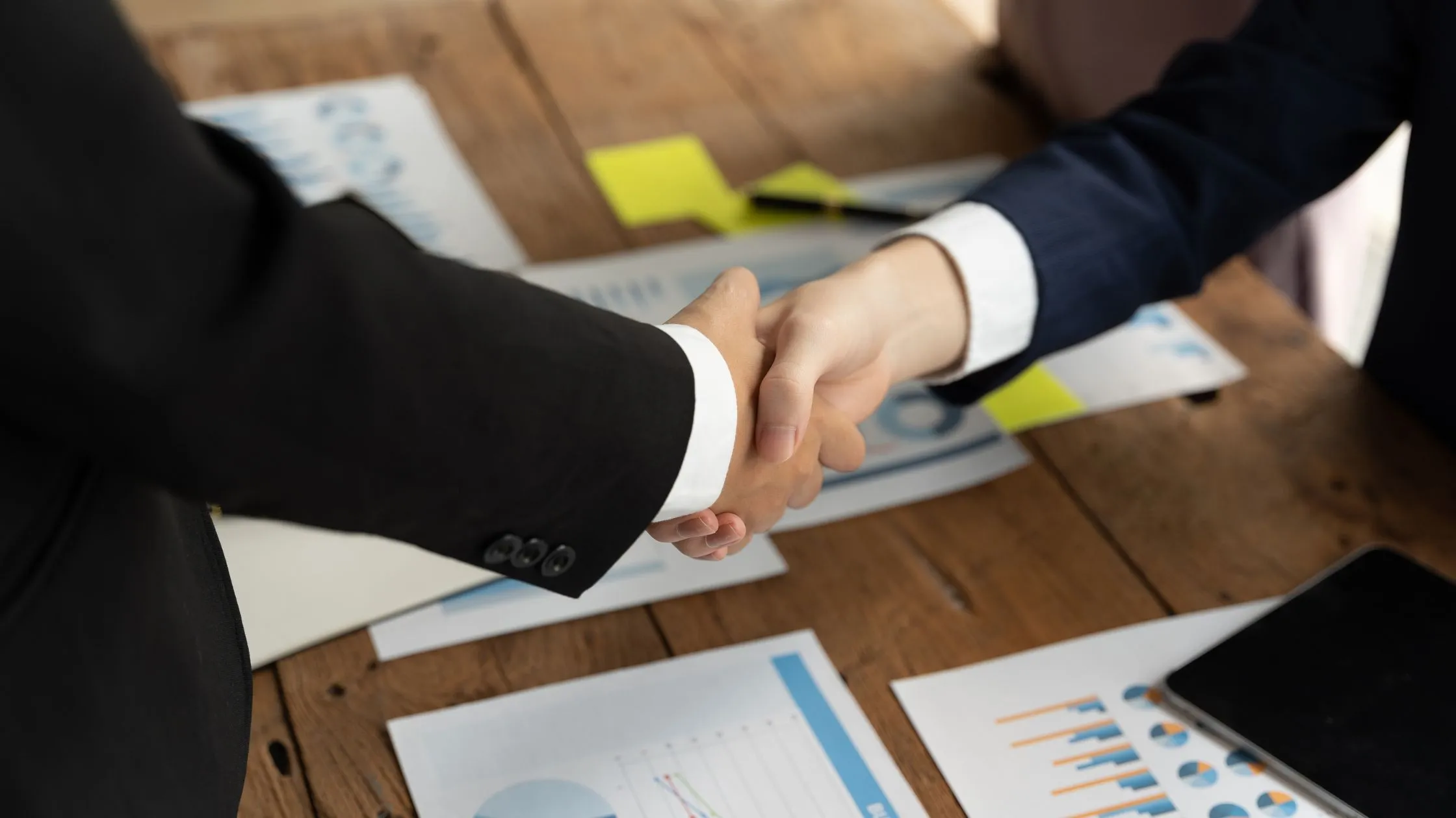 HAY Consultants healthcare business consultants discussing financial and performance data